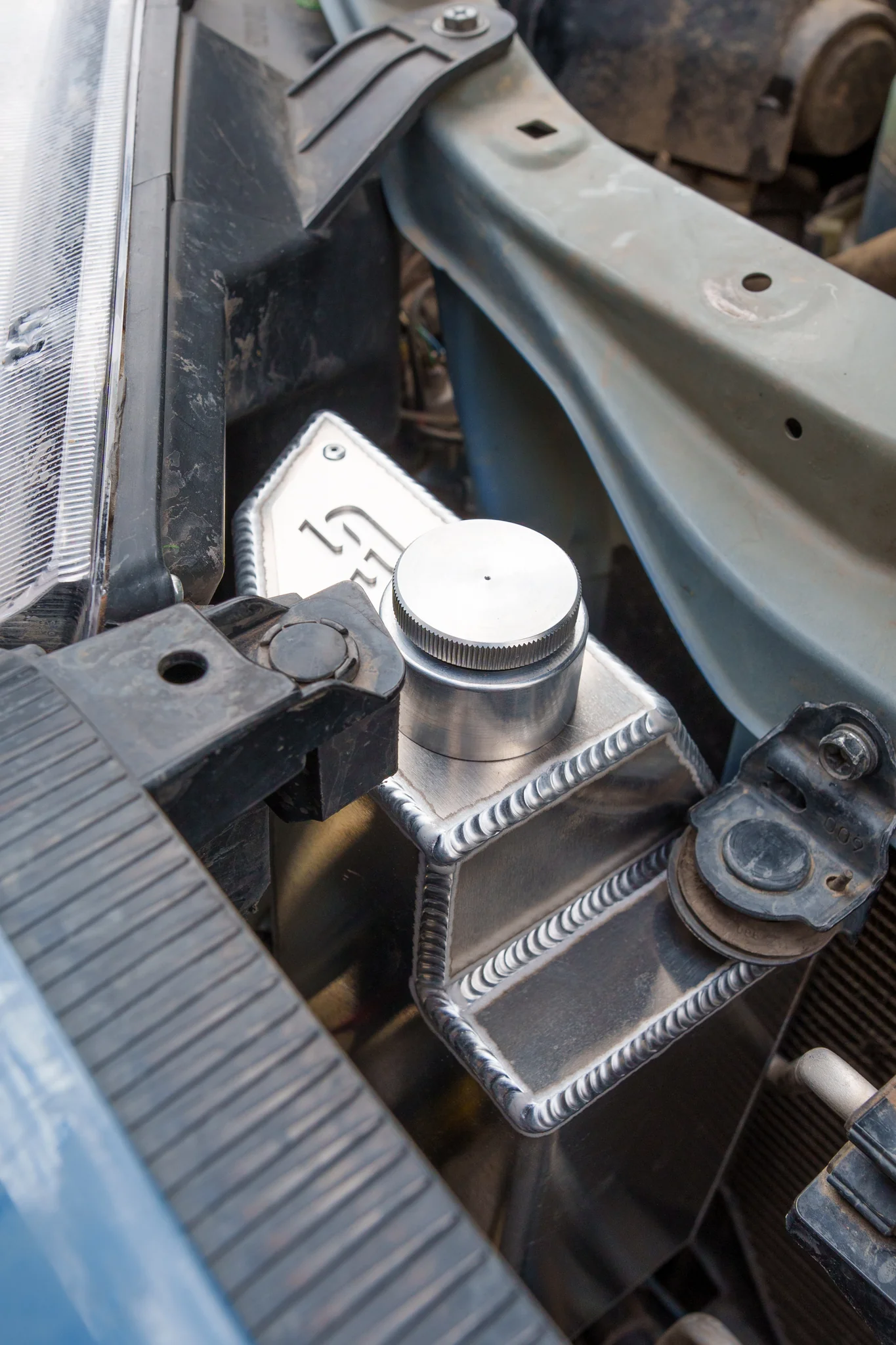 Snowbound Customs 5th Gen 4Runner Aluminum Washer Fluid Relocation Reservoir