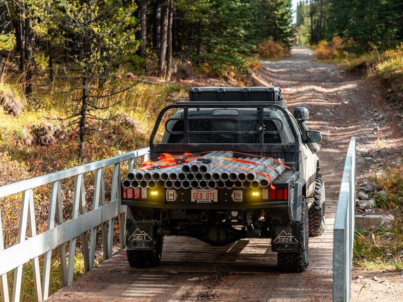 Off-road vehicle with a unique design on a forest road